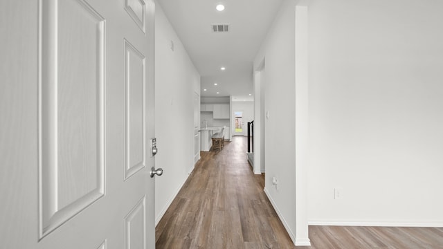 hall featuring light hardwood / wood-style floors