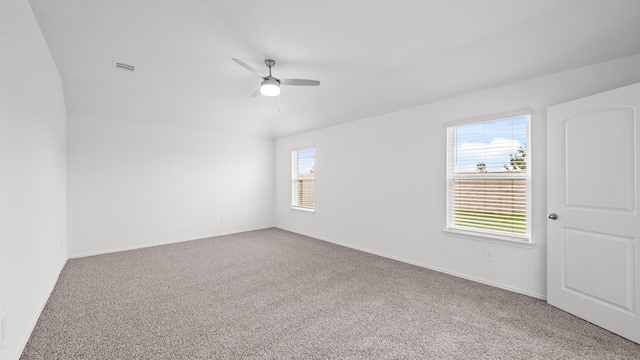 spare room with carpet and ceiling fan