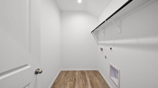 laundry area featuring hardwood / wood-style floors, hookup for a washing machine, electric dryer hookup, and gas dryer hookup