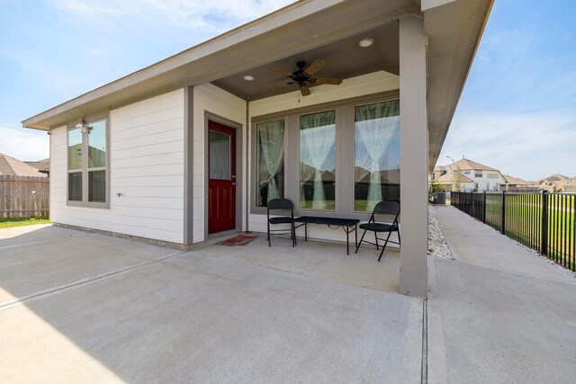 view of patio / terrace featuring ceiling fan