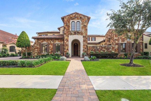 view of front of house with a front lawn