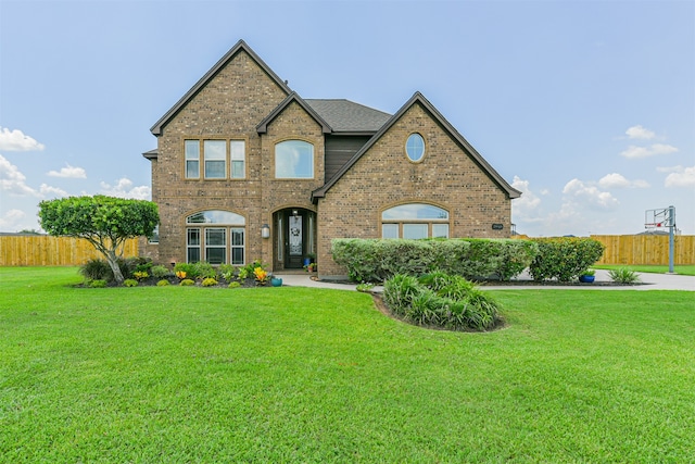 front of property featuring a front lawn