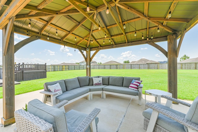 view of patio / terrace with outdoor lounge area and a gazebo