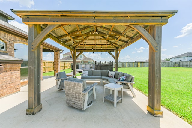 view of patio / terrace featuring an outdoor living space and a gazebo