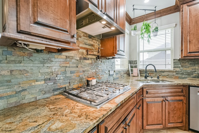 kitchen with crown molding, stainless steel appliances, sink, decorative backsplash, and extractor fan