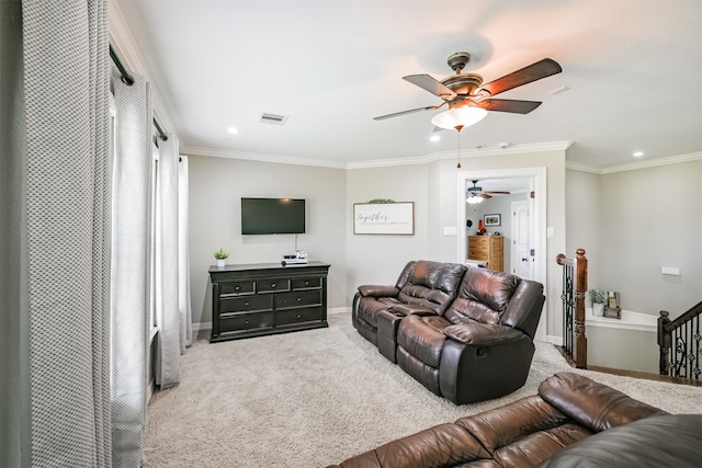 living room with carpet, ceiling fan, and ornamental molding