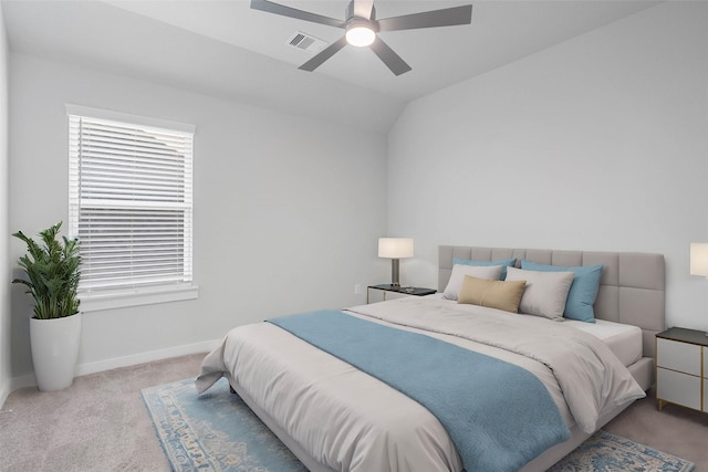 carpeted bedroom featuring ceiling fan and lofted ceiling