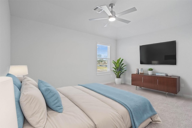 bedroom featuring ceiling fan and light colored carpet