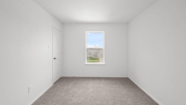 empty room with carpet floors