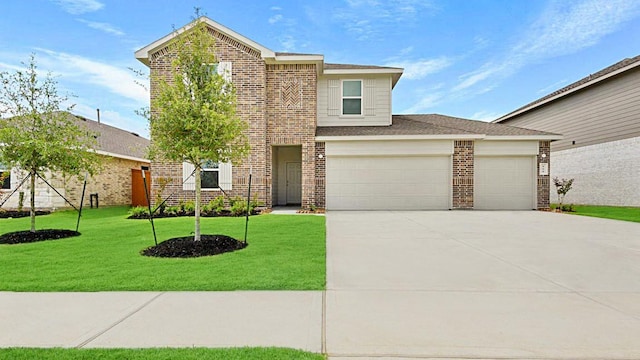 view of front facade with a garage and a front lawn