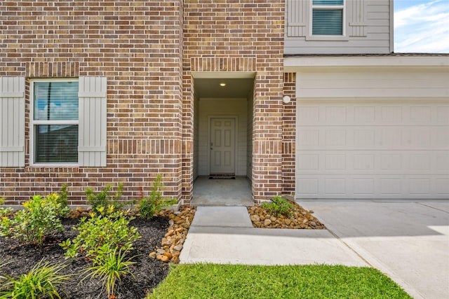 property entrance with a garage