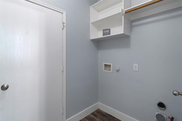 laundry area featuring hookup for a gas dryer, dark hardwood / wood-style flooring, and washer hookup