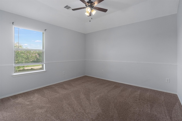 carpeted empty room with ceiling fan