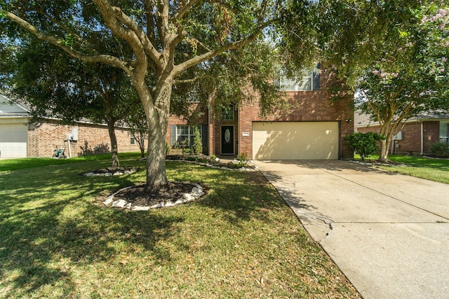 view of front of house with a garage and a front lawn