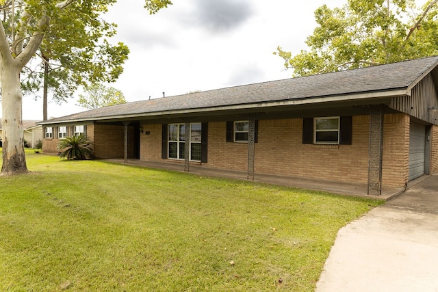 ranch-style house with a front lawn and a garage