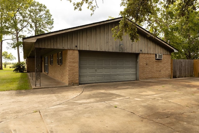 garage with an AC wall unit