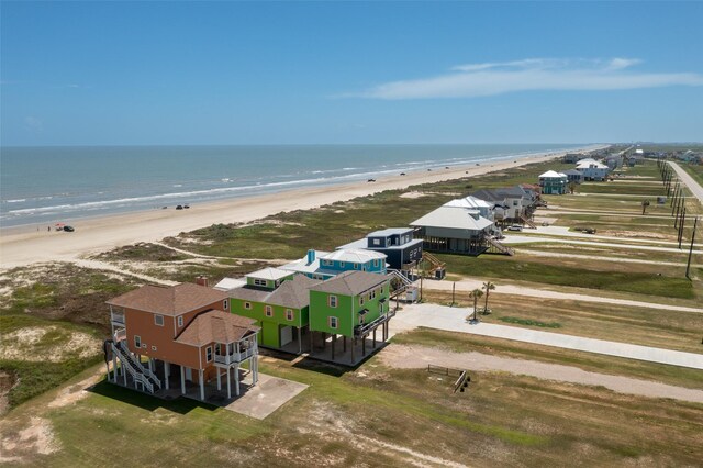 aerial view featuring a water view and a view of the beach