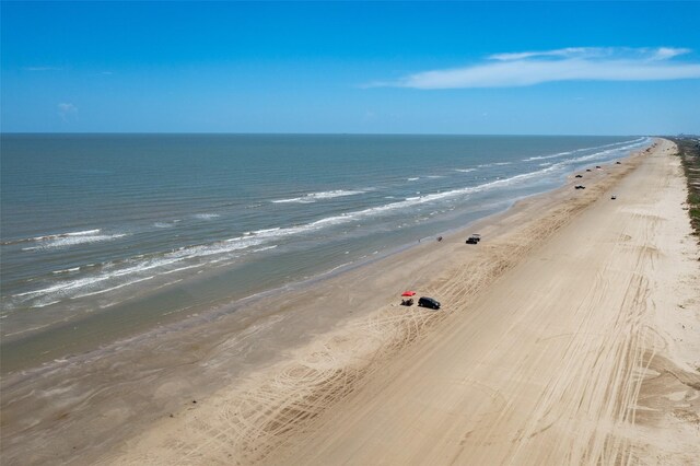 property view of water featuring a beach view