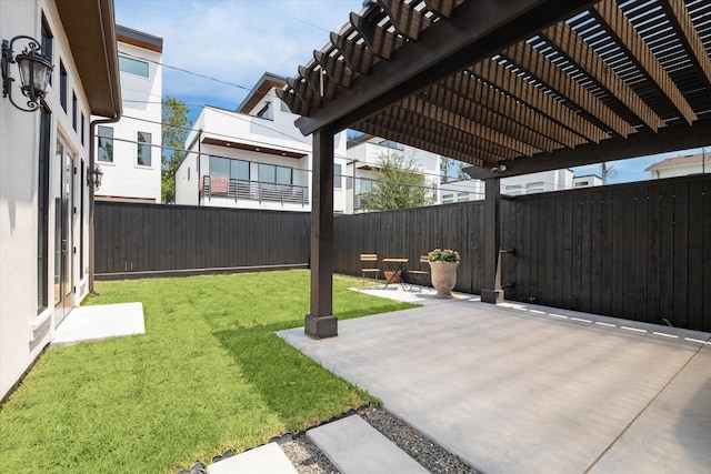 view of yard with a pergola and a patio