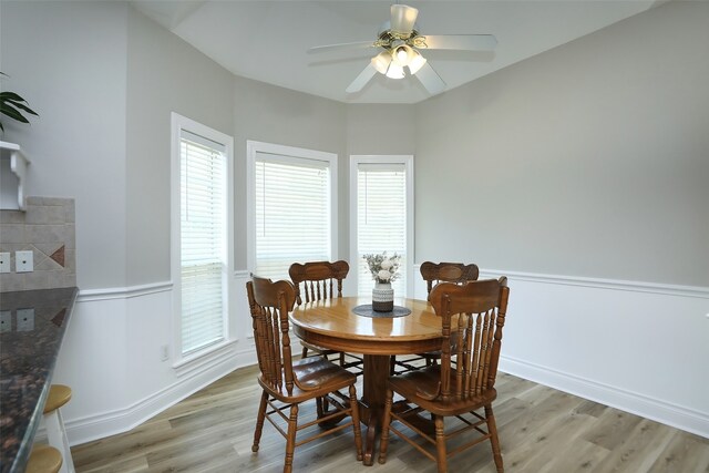 dining room featuring ceiling fan and light wood-type flooring