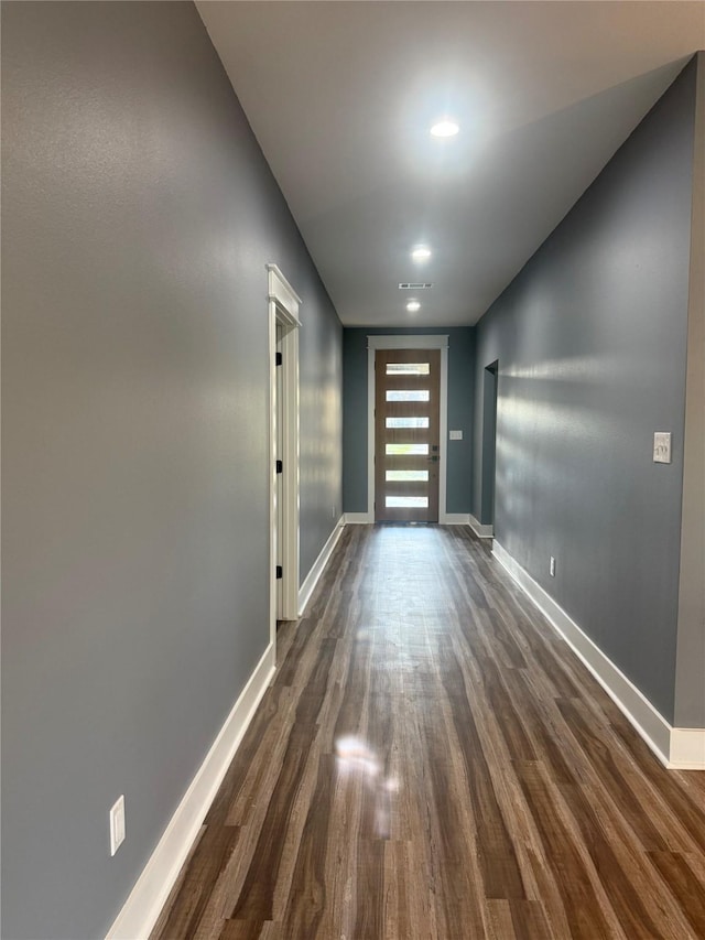 interior space with dark wood-type flooring