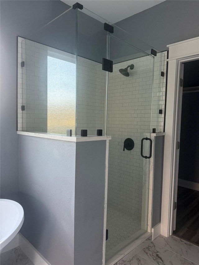 bathroom with walk in shower