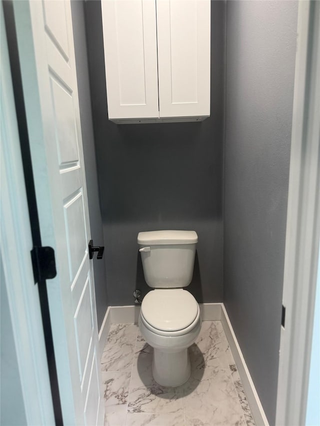 bathroom featuring toilet