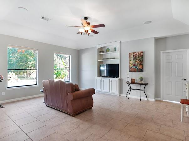 living room with ceiling fan