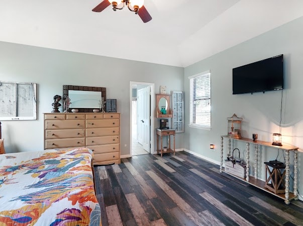 bedroom featuring ceiling fan and dark hardwood / wood-style flooring