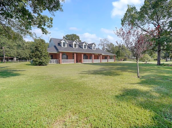 view of front of home with a front lawn