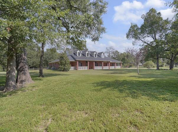 view of front of home with a front lawn