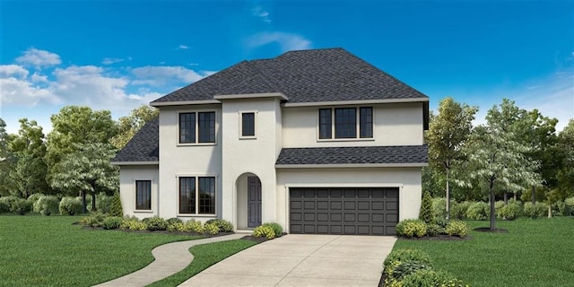 view of front facade with a front yard and a garage