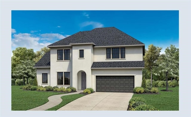 view of front of house featuring a front yard and a garage