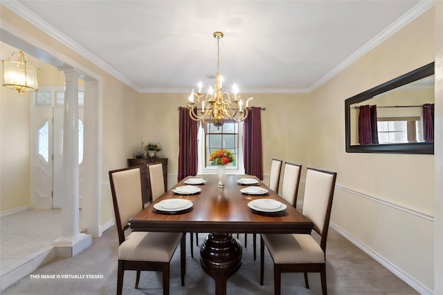 dining room with decorative columns, a notable chandelier, carpet flooring, and plenty of natural light