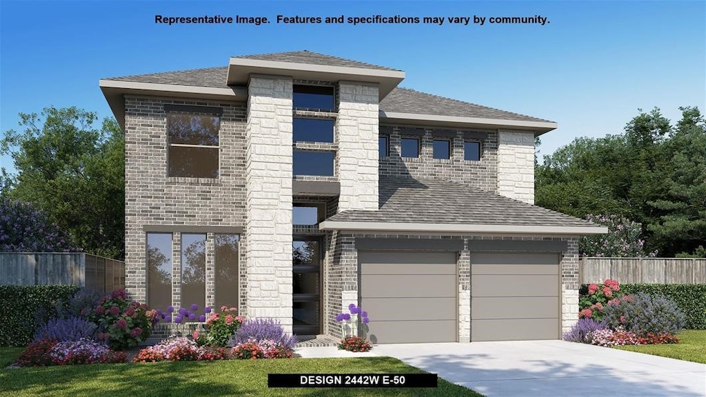 view of front of home with a garage