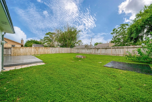 view of yard with a deck