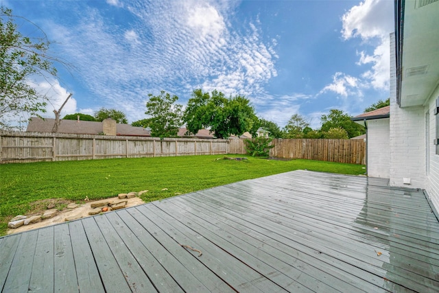 deck featuring a lawn