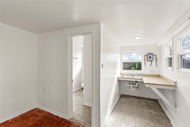 bathroom with vanity, tile patterned flooring, and toilet