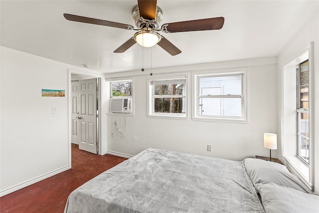 bedroom with dark colored carpet, cooling unit, and ceiling fan