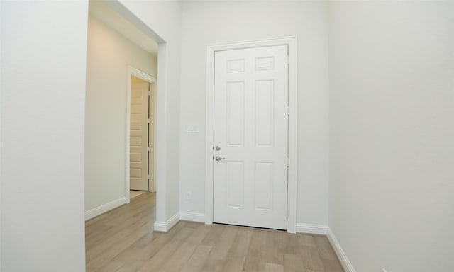 hall featuring light hardwood / wood-style floors