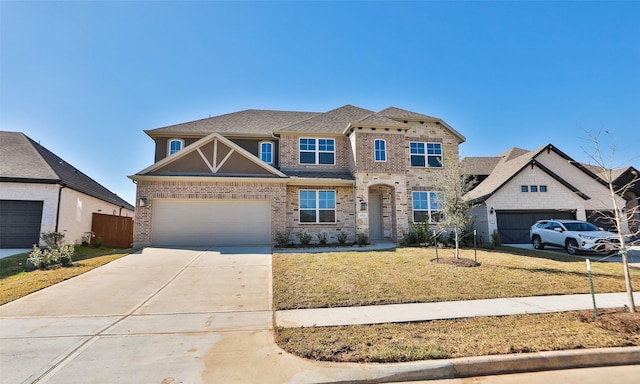 view of front facade with a front yard and a garage