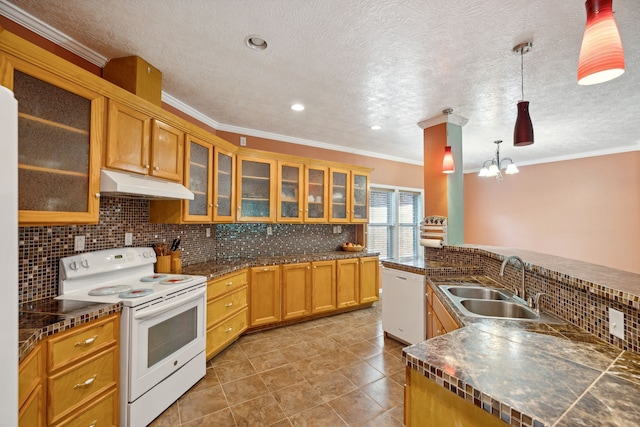 kitchen with white appliances, decorative backsplash, sink, light tile patterned flooring, and decorative light fixtures