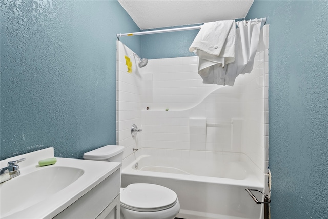 full bathroom with a textured ceiling, toilet, vanity, and bathing tub / shower combination