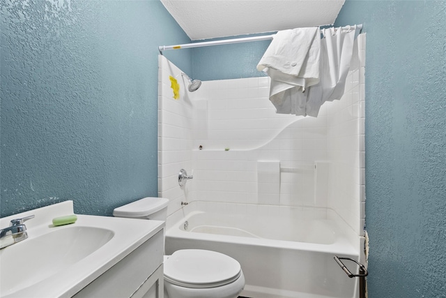 bathroom with toilet, shower / bathtub combination with curtain, vanity, and a textured wall