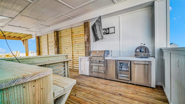 exterior space with wine cooler, fridge, and light hardwood / wood-style floors