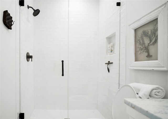 bathroom featuring walk in shower