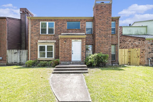 view of property with a front yard