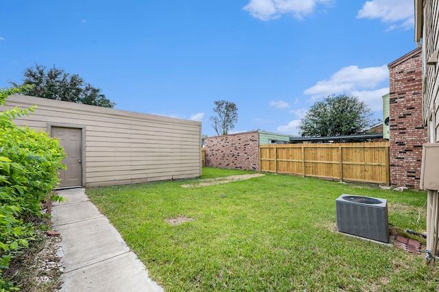 view of yard featuring central AC