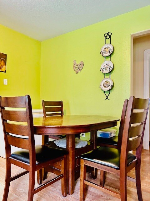 dining room featuring light wood-type flooring