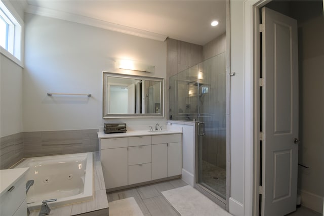 bathroom featuring ornamental molding, a shower with door, tile patterned flooring, and vanity